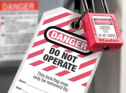 Danger Do Not Operate lockout/tagout tag with red padlock on electrical panel